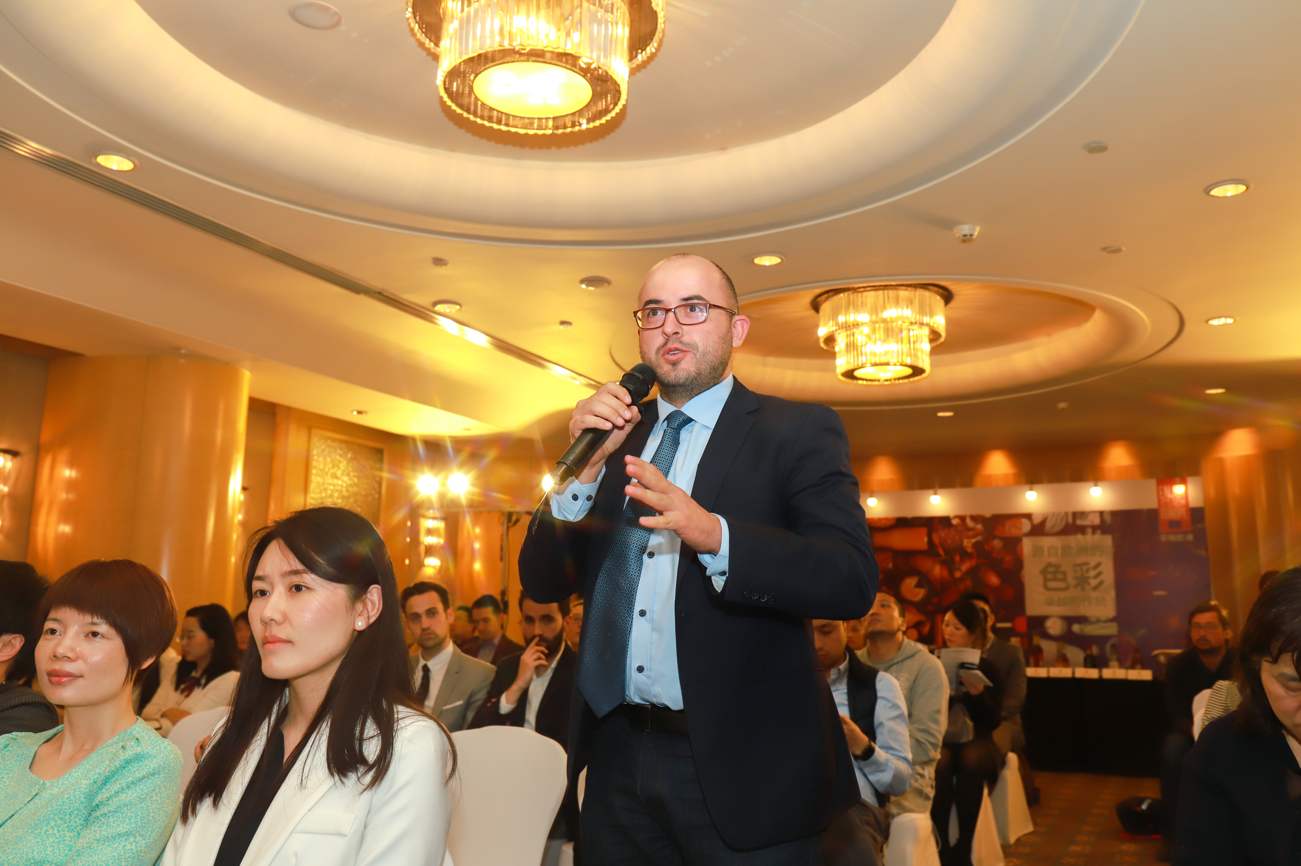 Speaker with participants during official campaign kick-off in Shanghai.